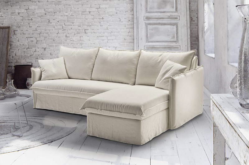 Vista frontal completa del sofá cama con chaiselongue modelo Grace en color blanco